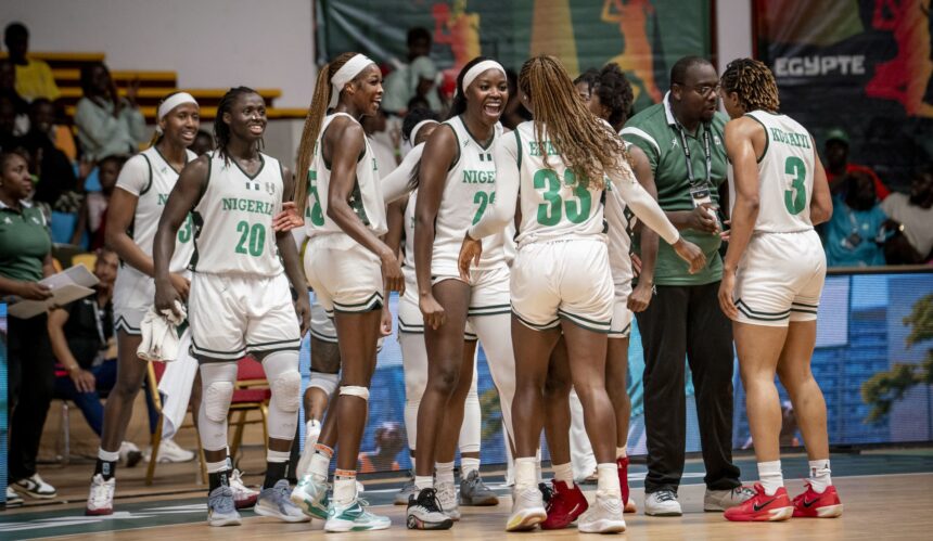 D'Tigress celebrate quarterfinal win over Cameroon