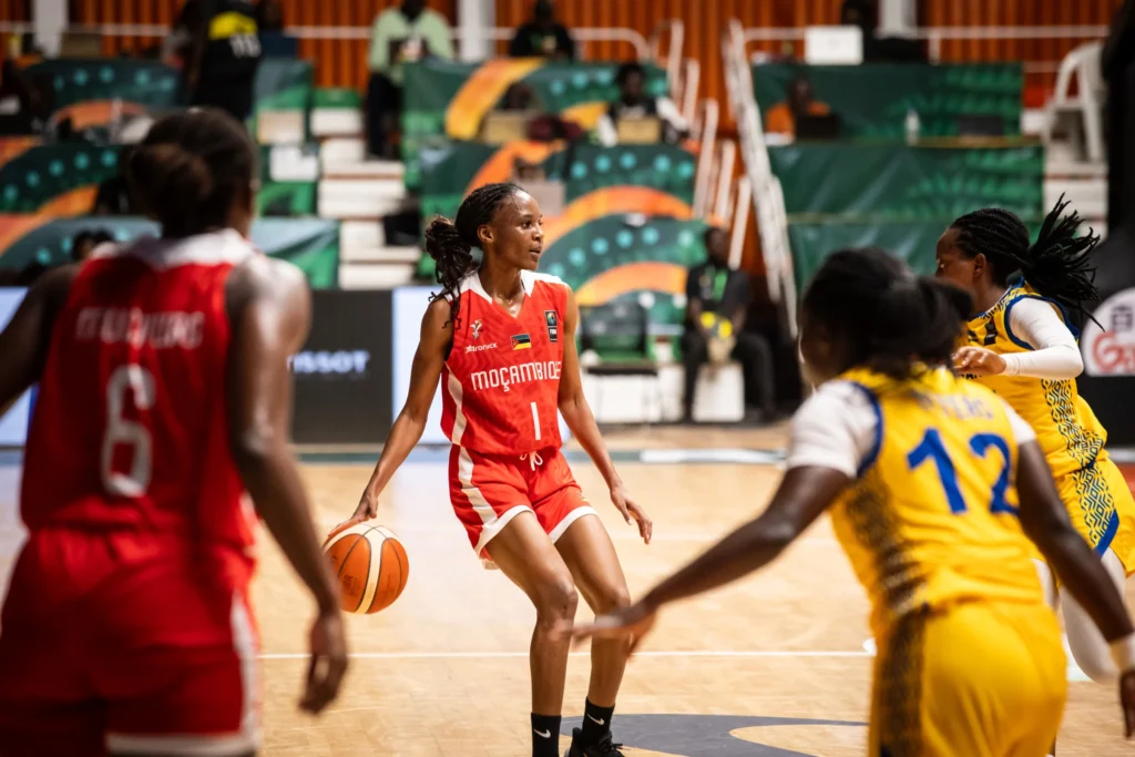 Mozambique players in action against Rwanda