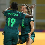 Ashleigh Plumptre celebrates with Chinwendu Ihezuo