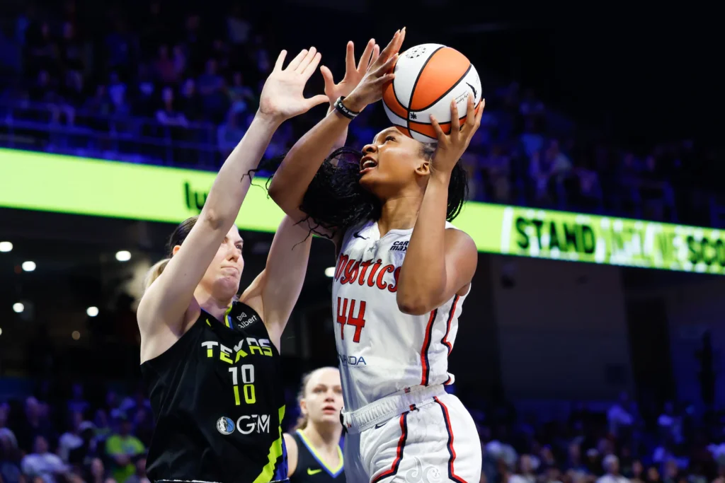 Kiki Iriafen attempts a layup