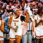 Lauren Ebo (middle, wearing the No. 1 shirt)