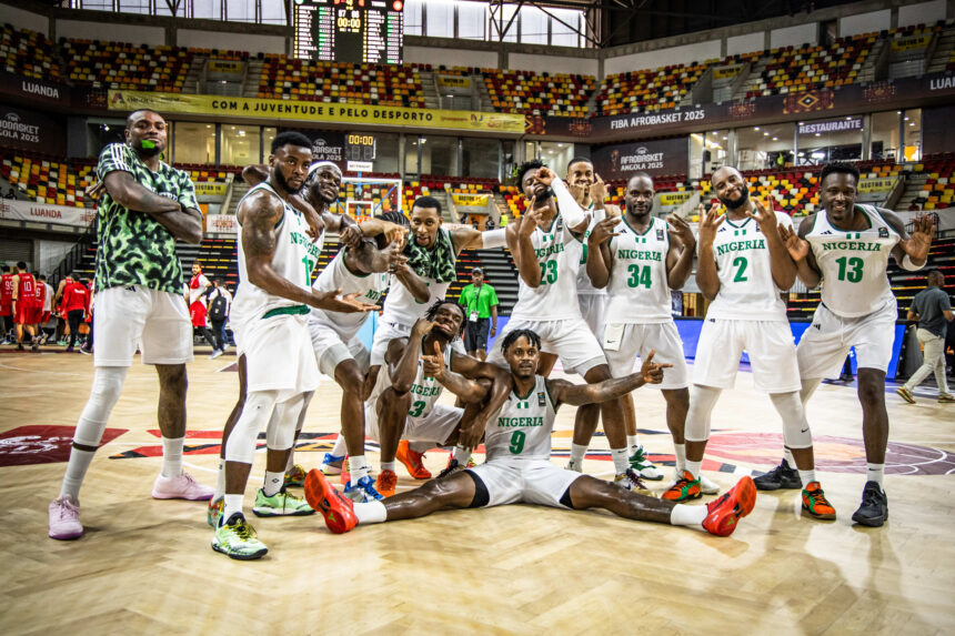 D'Tigers celebrate their win over defending champions Tunisia