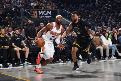 Josh Okogie (left)