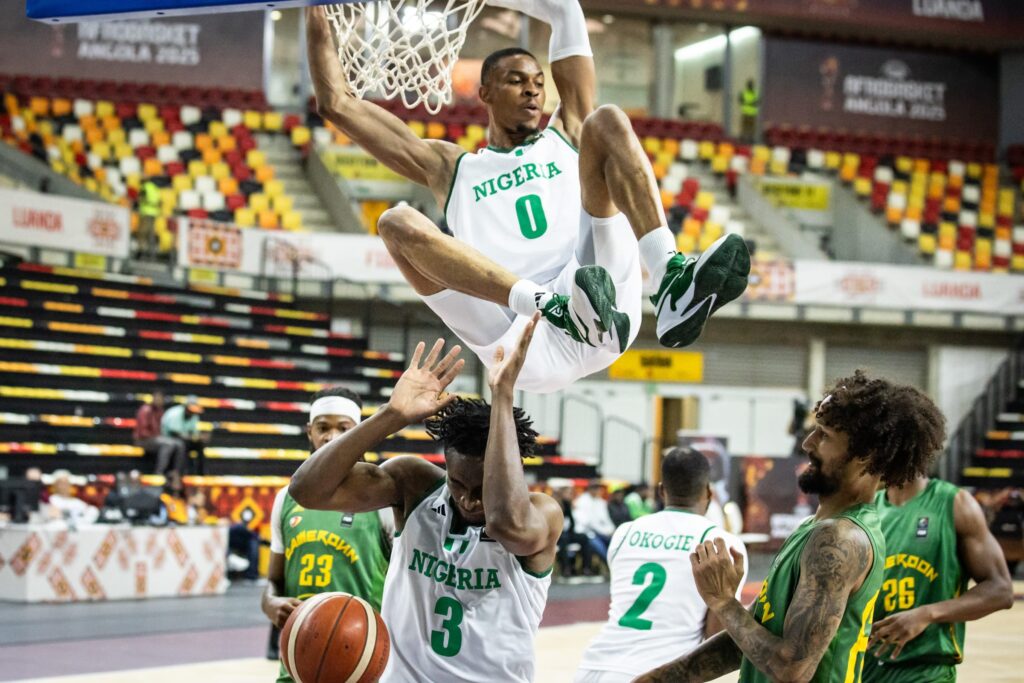 D'Tigers center Kaodirichi Akobundu-Ehiogu with a dunk
