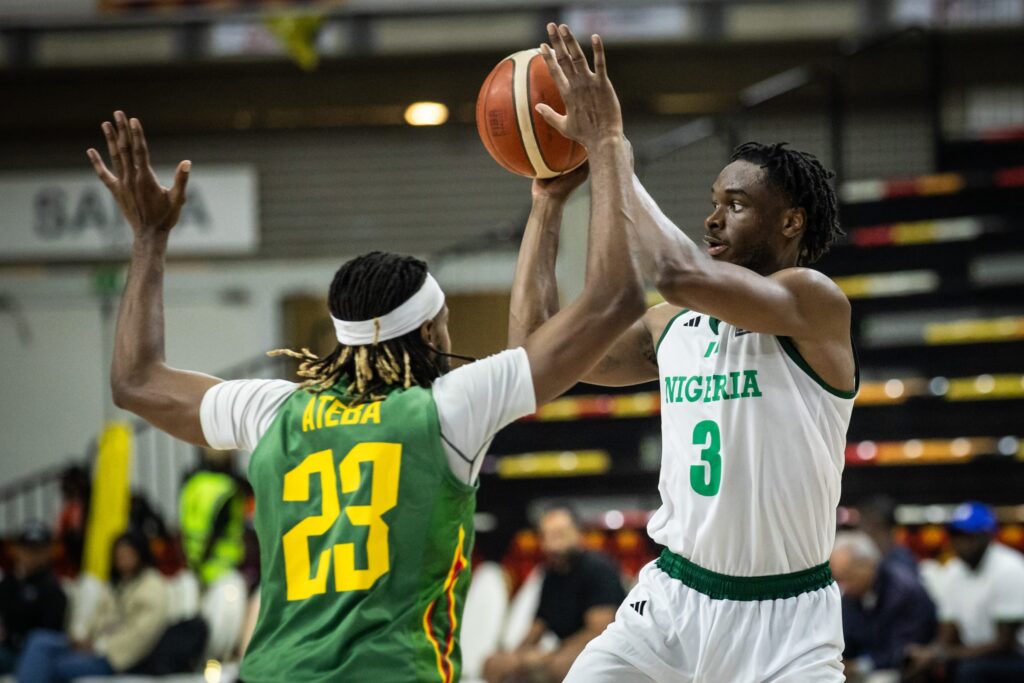 Caleb Agada (right) in action for D'Tigers