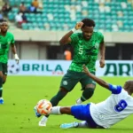 Bright Osayi-Samuel in action against Lesotho in Uyo