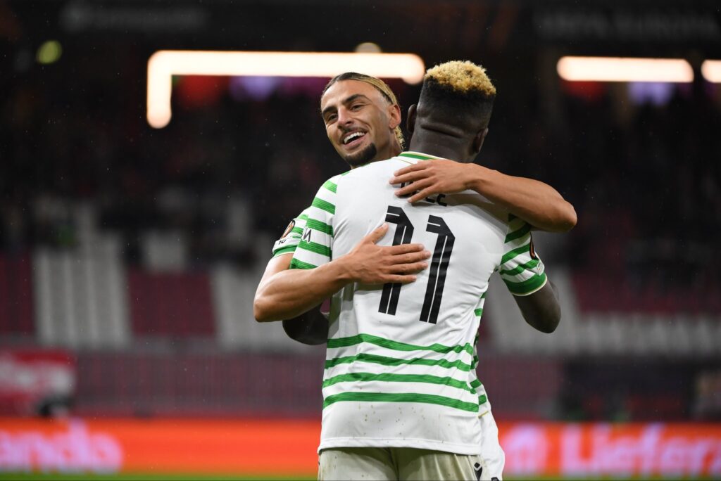 Bamidele Yusuf celebrates his goal with a teammate