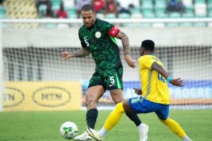 Troost-Ekong in action against Rwanda