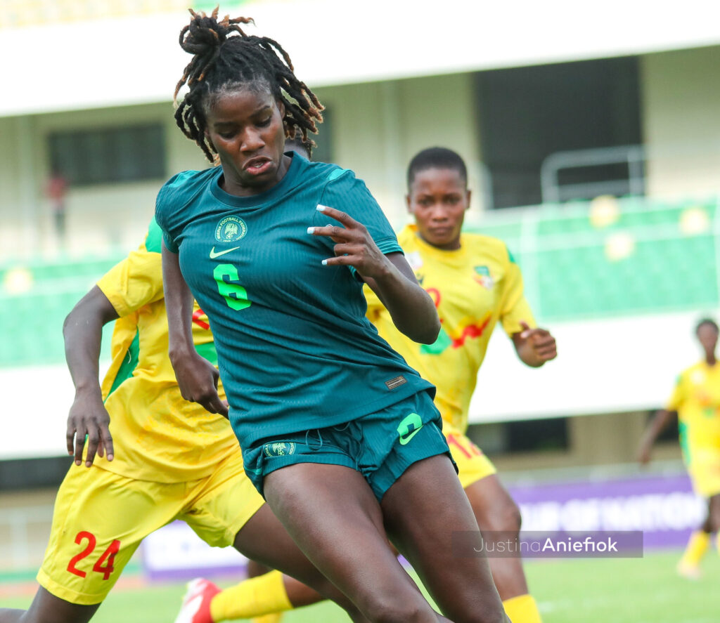 Super Falcons forward Esther Okoronkwo in action against Benin