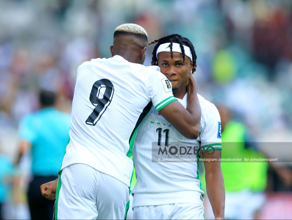 Osimhen celebrates his goal with Samuel Chukwueze