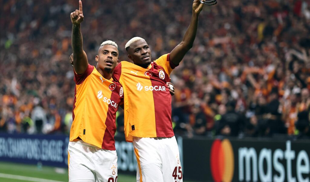 Osimhen (right) and Mario Lemina