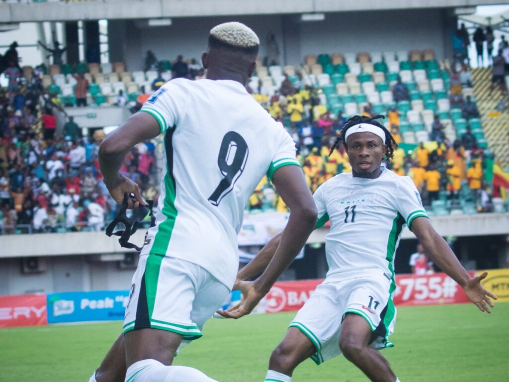 Osimhen (No.9) celebrates his gaol with teammate Samuel Chukwueze