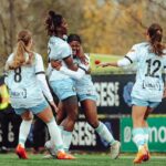 Esther Okoronkwo celebrates a goal with teammates