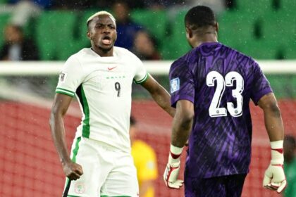 Nwabali celebrates with Victor Osimhen
