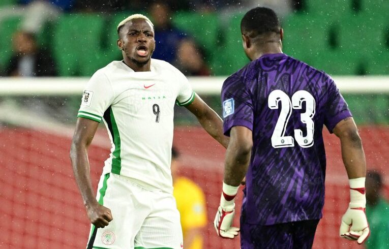 Nwabali celebrates with Victor Osimhen 