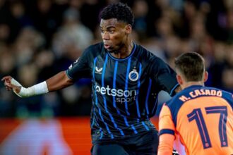 Raphael Onyedika in action against Barcelona
