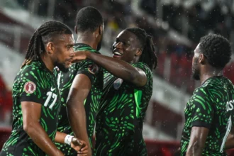 Super Eagles players celebrate a goal