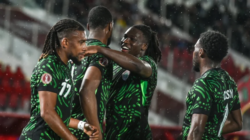 Super Eagles players celebrate a goal