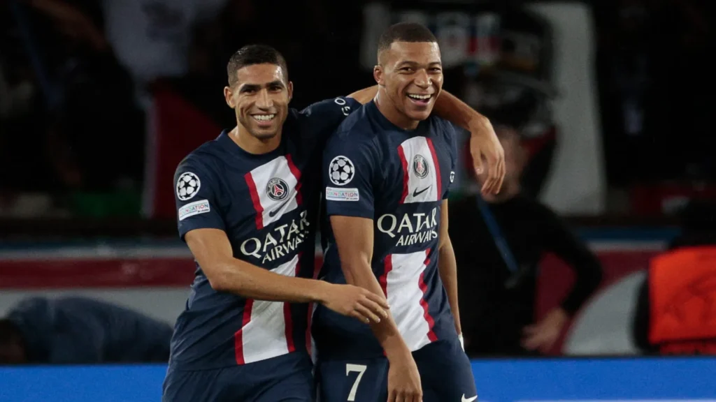Hakimi (left) and Mbappe at PSG