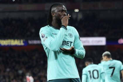 Arokodare celebrates his goal against Arsenal