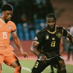Ivory Coast's Amad Diallo (left)