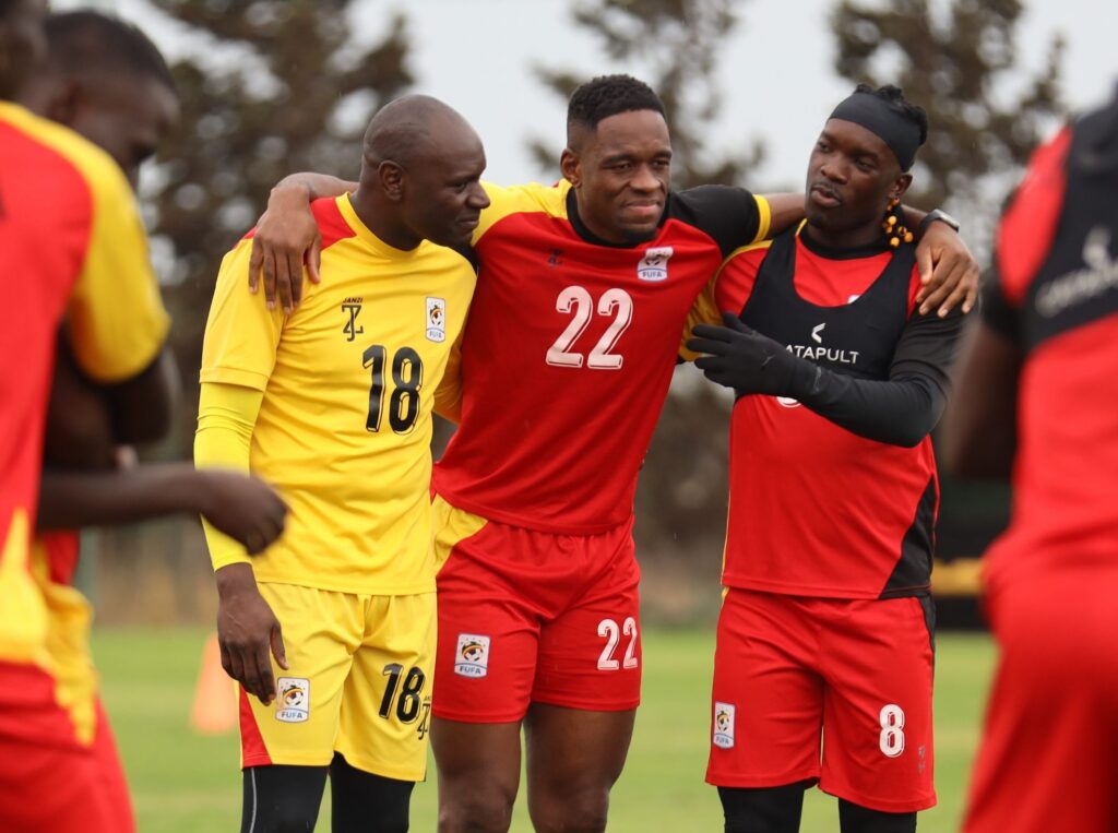 Uche Ikpeazu with his Ugandan teammates