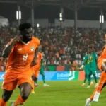 Franck Kessie celebrates a goal for Ivory Coast