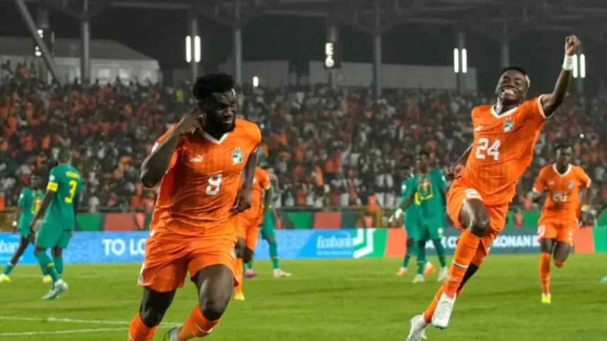 Franck Kessie celebrates a goal for Ivory Coast