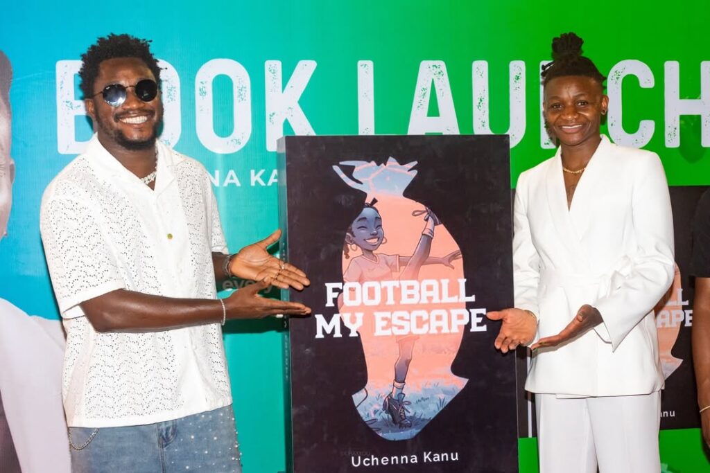 Artiste and content creator Nasboi (left) with Uchenna Kanu at the book launch