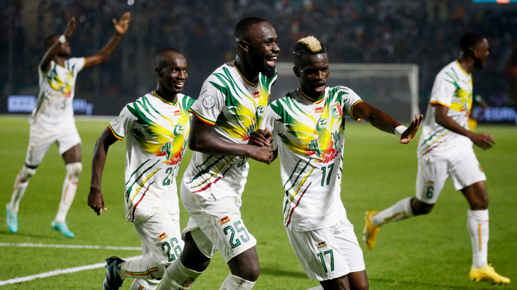 Mali players celebrate a goal