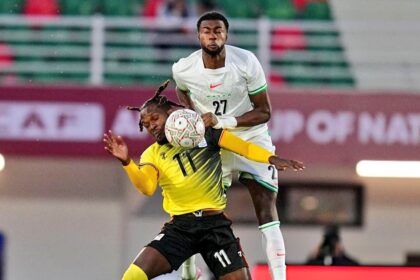 Ryan Alebiosu (up) in action against Uganda