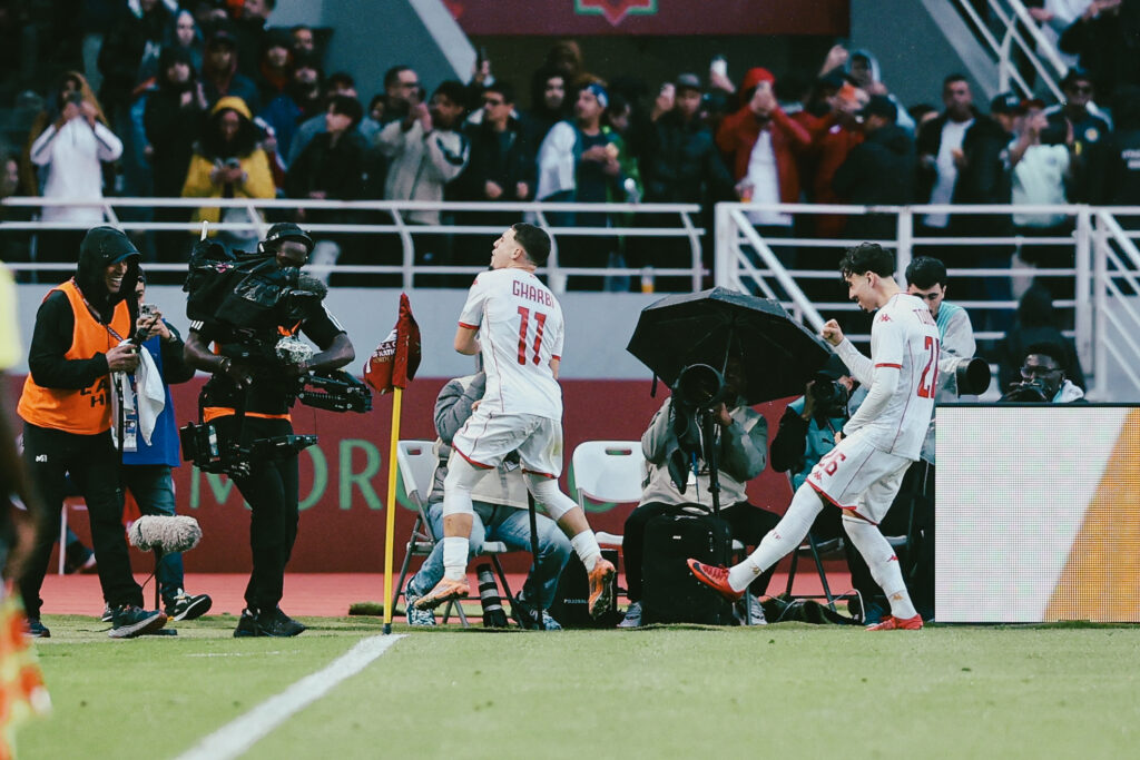 Tunisia's Ismaël Gharbi celebrates his goal against Tanzania