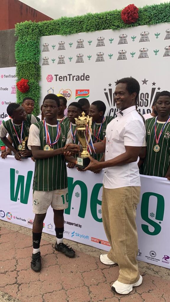 Lagos FA Chairman Hajji Gafar Olawale Liameed (right) presenting an award at the 2025 WakaPass Christmas Football Party