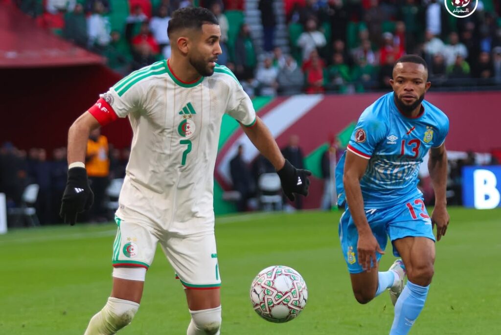 Riyad Mahrez (left) in action against DR Congo