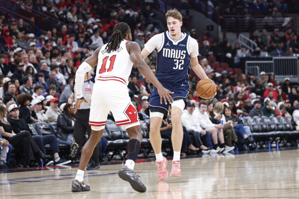 Dosunmu, Okoro combine for 33 as Bulls beat Mavericks 125–117 38 Ayo Dosunmu (No. 11) guarding Dallas Mavericks' Cooper Flagg