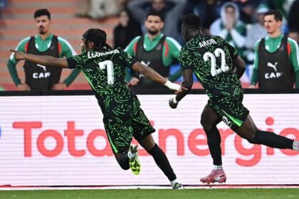 Ademola Lookman celebrating a goal with Akor Adams