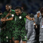 Alex Iwobi celebrating with teammates