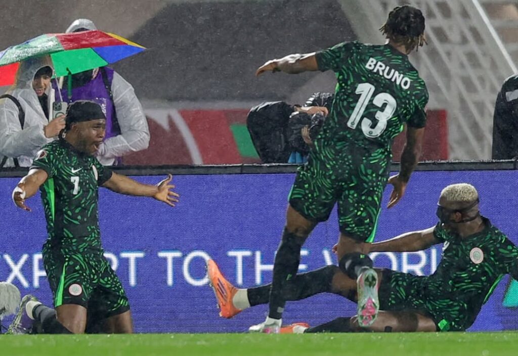 Ademola Lookman celebrates with Victor Osimhen