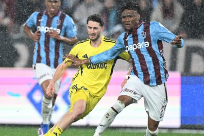 Chibuike Nwaiwu (right) in action against Fenerbahce
