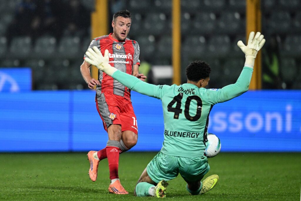 Maduka Okoye (No. 40) trying to save Jamie Vardy's effort