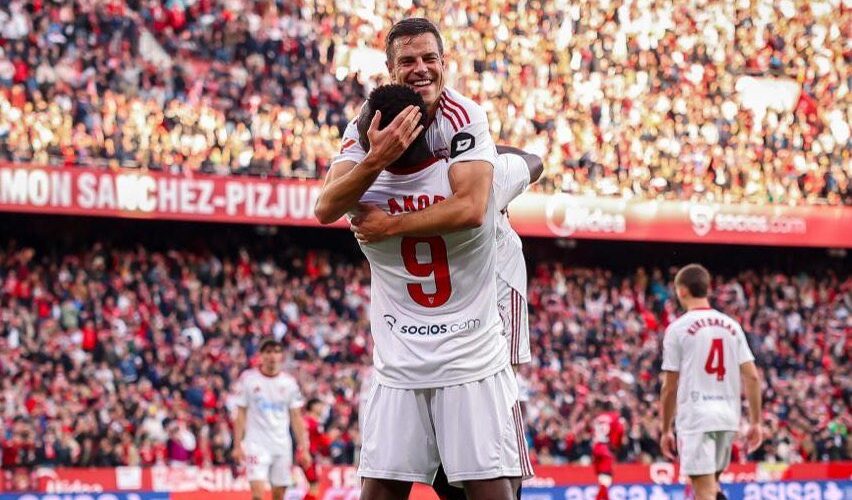 Akor Adams takes responsibility despite scoring in Sevilla draw 39 Adams celebrates his goal with teammate César Azpilicueta