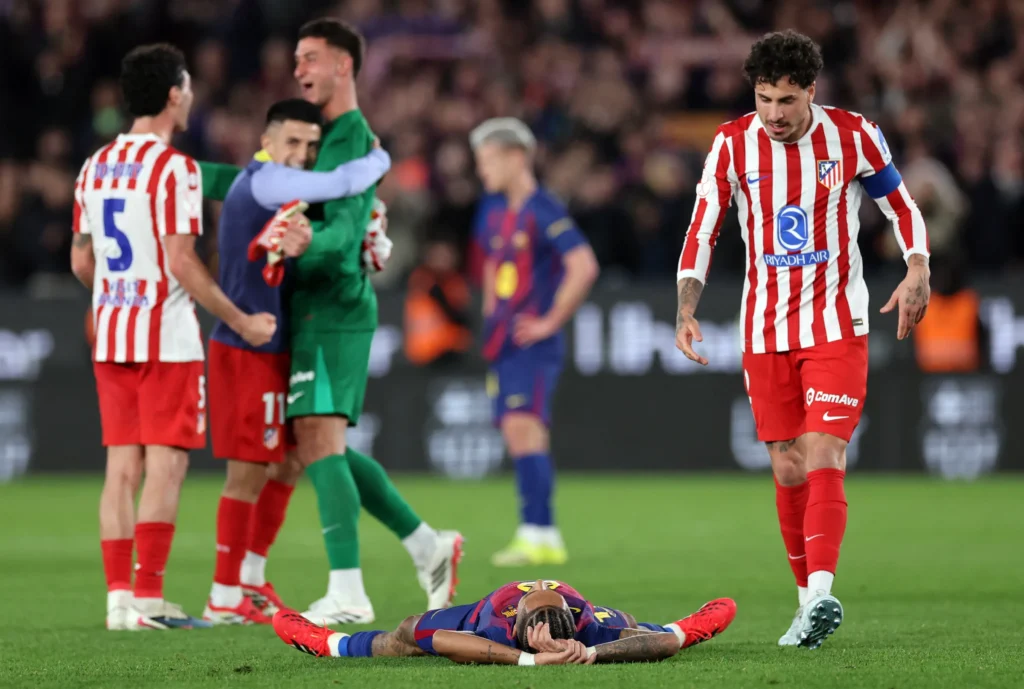 Simeone regrets failed Lookman strategy despite final qualification 39 Barcelona winger Raphinha lamenting on the floor after they fgailed to qualify to Copa del Rey final