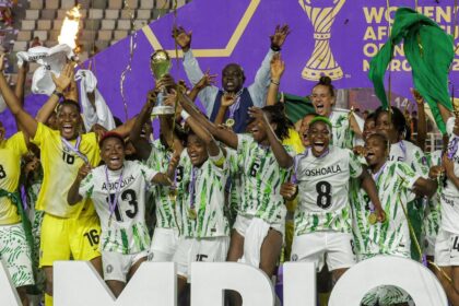 Super Falcons lifting WAFCON 2024 trophy in Morocco