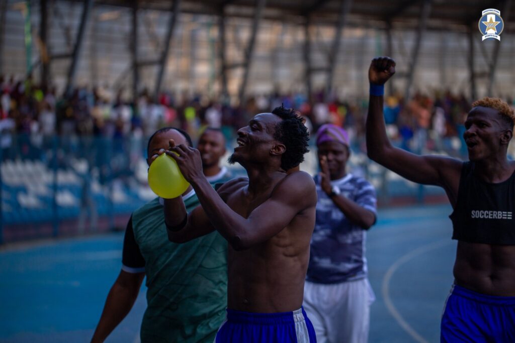 Shooting Stars' Qamar Adegoke celebrating with fans after scoring a late winner