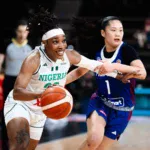 D'Tigress' Ezinne Kalu (left) in action against the Philippines