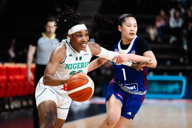 D'Tigress' Ezinne Kalu (left) in action against the Philippines