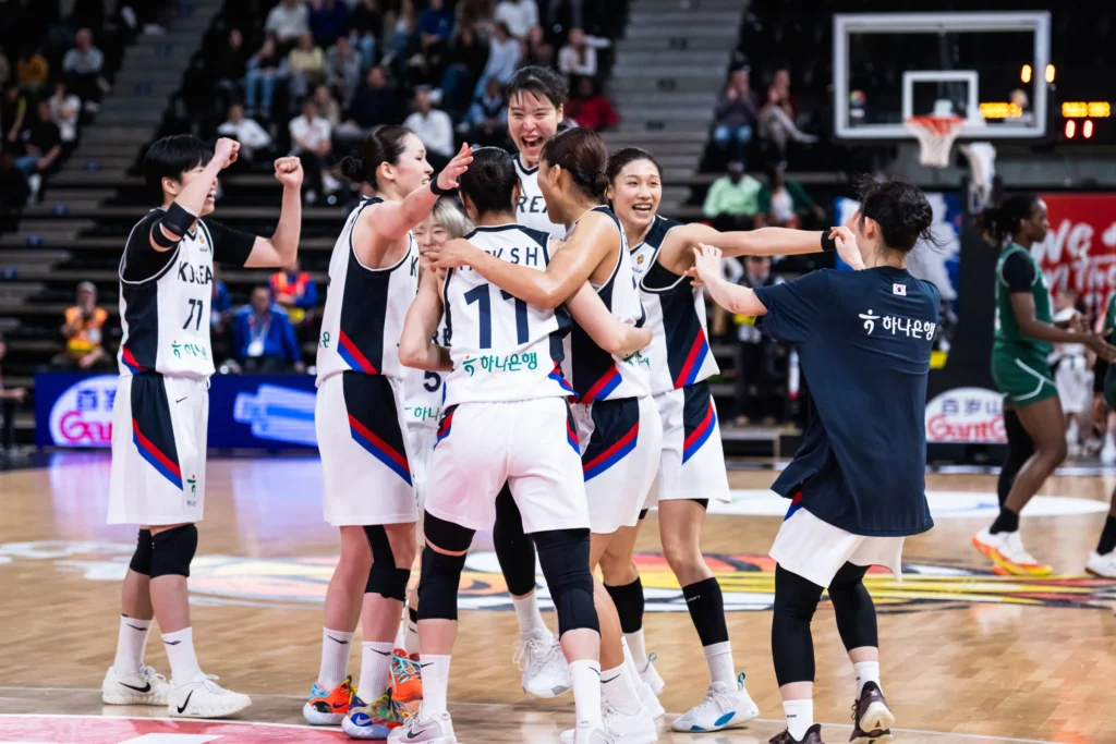 South Koreans celebrate their win over the D'Tigress