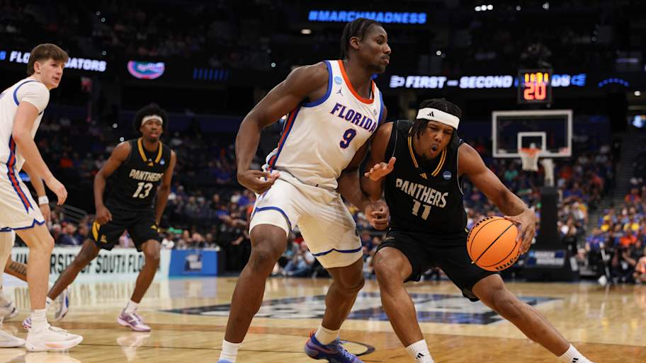 Rueben Chinyelu declares for 2026 NBA Draft, retains college eligibility 38 Rueben Chinyelu in action during NCAA basketball game showcasing defensive strength