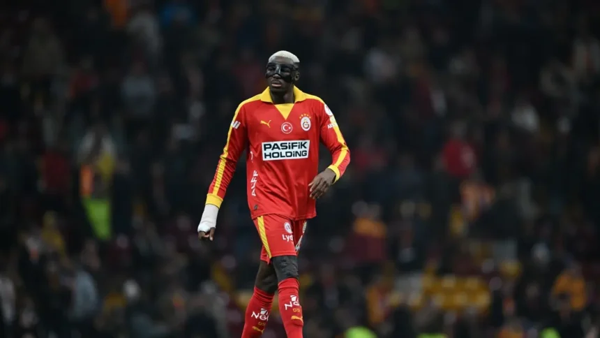 Osimhen wearing the hand protective gear