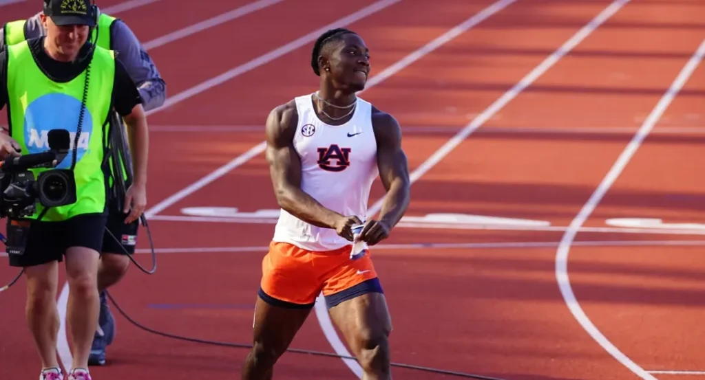 Kanyinsola Ajayi celebrates his NCAA 100m win